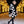 Ashlee - Avvolgimento in maglia testurizzata nera/crema con collare in finta pelliccia