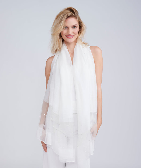 White oblong wedding scarf featuring a sheer lightweight fabric for a clean, elegant finish. Designed with subtle pearl embellishments at the ends for a refined decorative detail. Suitable for versatile draping to cover shoulders for bridal and occasion wear.