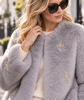 Portia - Veste courte en fausse fourrure