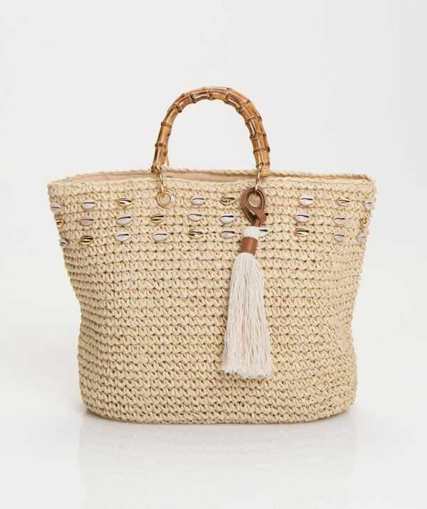 Natural woven straw tote bag with crochet weave, double handles and tassel detail. Lightweight beach, holiday, shopping and everyday bag.